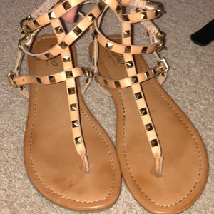 Tan and gold gladiator sandals